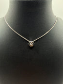 Collana punto luce con castone esagonale e diamante
